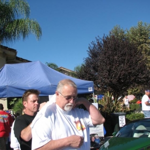 Me and Chip Foose Drawing a Hot Rod on my shirt. 10/09