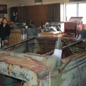 Me at "goatboys" garage watching dad and goatboy work on dads truck