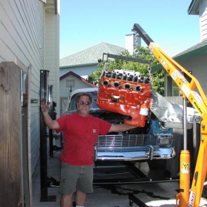 56 Chevy Engine Swap ...got that big 'ol bugger out.