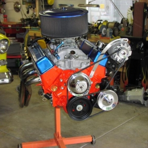 The 327 out of my 55 Chevy.  I freshened it up with the heads rebuilt, a hot new Comp Extreme Energy cam, and a new high volume oil pump.  I'd been running a Muncie 4 speed with it in my 55, but the 56 had a race-built 400 turbo with a 3500 stall converter.  The 56 had 4.88 gears with a spool.  It made for a car that was fun around town and for short drives, but not much good for long trips or highway use.