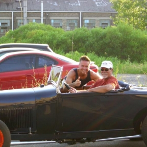 Getting my picture taken with Rochie (HAMBer) out side the shop who was one of the brave souls heading to the west coast in his fresh 29 roadster...after the BBQ......great guy.....have fun Wayne!