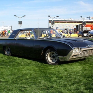 I had to take this pic. It's in the grass on the front straightaway of Lowes Motor Speedway. Hell, even in this pic, the crusty, peeling paint sorta looks good.