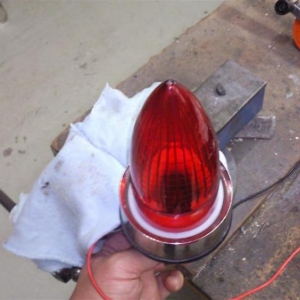 When the light is off the adaptor gives a nice white surround to compliment the light colored pinstriping on the car.