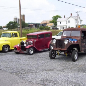 How about a rat rod / gasser built by us from a 48 willys? The other 2 were built by me and my friends also.The Yellow truck was a barn find here in Tennessee the A hammer was found in South Dakota layin on the ground with not a smudge of paint but in good shape..All the sheet metal is Henry Ford steel..including the original grill shell