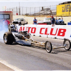 A licence pass in my freshly restored 68 Fuller FED. Ran an 8.87 @ 154 mph. that day. Pretty good for the first engine I ever built