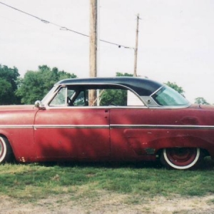 2003: The car has actually changed very little since these photos were taken. The interior is all out now, and the headliner has fallen down. The interior chrome has also deteriorated in storage, but the body is pretty much the same. The front end sits very low at this point. They later put twist-in coil spring spacers to raise it a couple inches. You can bet those will come out as soon as I get it home!