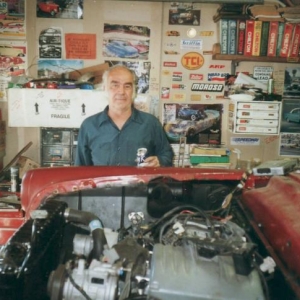 2003: All these scanned photos were taken in 2003, the year the engine was installed. I think this is Sonny, the mechanic who did the most recent mechanical work in 2003. I got several invoices detailing the work he did, the parts he used and the amount he charged.