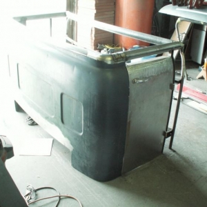 building a tool box out of the back of a 1/2 ton truck cab. The door on the right side is a sectioned down right door from the donor truck.