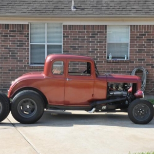 Coupe with 16 x 13 's on back. Rain tires if it ever rains in Texas !