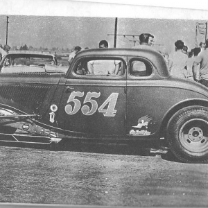 LIONS pits, August 3, 1963, after the car was sold. Note Mooneyham & Sharp has been removed from the hood.