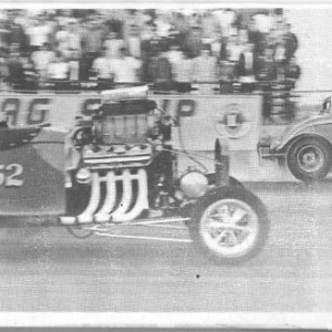 Racing Cederquist Bros. for the # 1 spot. Unfortunately Larry's hole shot went for naught as the coupe's 400" hemi blew all to hell before the lights, and Gene had to forefeit the title. The coupes new owner insisted that Gene lean on the motor hard, and it cost them.