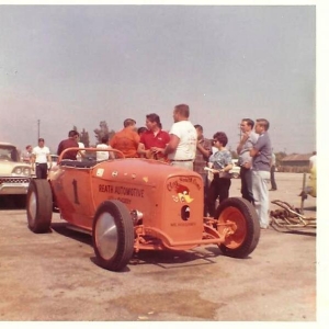 Burkhart Bramer & Burns. On this day they were running Frank Cannon's Chrysler and stunned everyone by making the first ever high gear only pass with an altered roadster. They ran 163 in the 9.90's, and gave Ted Cyr a good run for top eliminator.