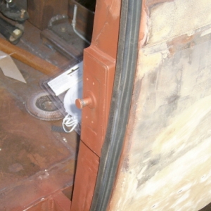 After  cutting the body in two w/ a sawzall and widening it 5" using a strip out of a 92 Jeep Laredo roof,I welded in a floor and put new door jams in. Also you can see where i reused the Jeep Laredo door weatherstripping.