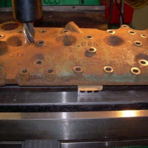 The basic set-up for mill the bosses for the head bolts using a 1.000" dia 4 flt HSS endmill.