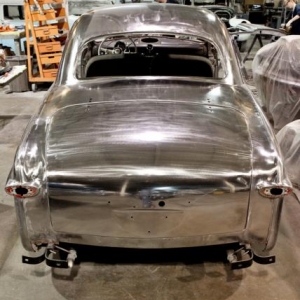 See the bare steel '49 shoebox at 2012 Detroit Autorama. All original panels. Polished. Wear sunglasses.