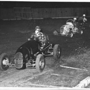 Council Bluffs, Iowa, 1948. The leader had just spun right in front of Dad. He cleared the leader, and went on to win the main. Dad's was the only V8-60 in the field of Offys.