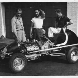 Early 1946,Danny Oaks, Dad, and Dean Whalen, Dad's buddy that I was named for. This shot was taken in front of Eddie Meyer's shop when they were just getting the new car sorted out.