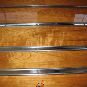Finished with Bruce Horkeys spar varnish. The wood is "heirloom Cherry" From rough cut lumber that had been in my Father in law's wood shop for over 20 years. We did all the work ourselves.