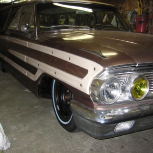 Man this thing is low, tried to drive it down my dirt driveway and caught a bunch of grass  on the crossmember
the exhaust tips sit close to the ground.