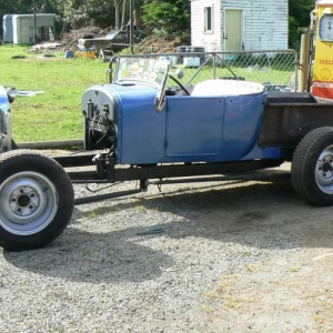 P1030131  As we got it . 26 on an A chassis with 28-29 radiator and shell,4" drop front end,3.7:1 V8 rear with 39 brakes and 16'' 46 reversed rims. November 2011.