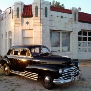 Old dealership / service station in Sandwich, IL. Summer, 2012.