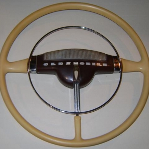 NOS 1942 Oldsmobile steering wheel. Never used, never even installed before. Another HAMB deal. I added the slightly used 1947 horn button for the center of the wheel.