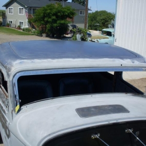 SDC11948 bought the roof insert from Bobby Walden while I was at the Grand National Roadster Show in Pamona, Jan. 2012.  Had Riley Morris of Rocket's Hot Rod Garage install it with a channel and screws so it could be removed and upholstered to look stock.