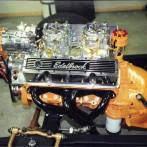 4 bolt main 350 with forged pistons bored 30 over with early 202 heads with hardened seats. Intake is an offenhauser 360 with 2ea 500cfm edelbrock carbs