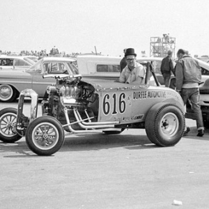 I snapped this picture of Nick Cirino's Durfee Auto roadster at the 1960 March Meet. Nick later became a good friend, and I did a lot of machine work for his "Big Al's Carponents business in the '90's.