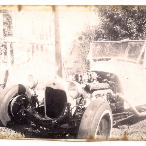 My roadster first running mock up in 1958 but not done yet.
I forgot how goofy I did the mock up EX,just cut stock castiron ex and hooked up stuff to try around the block,had some fussy naibers that loved to call the cops for anything. Thank goodniss they moved away in 59.
1928 "A" with 48 front axle and 49 Olds rear,V8 Ford T-bird power