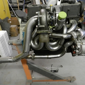 Custom turbo header, down pipe, and waste gate return, on Ford 2.3