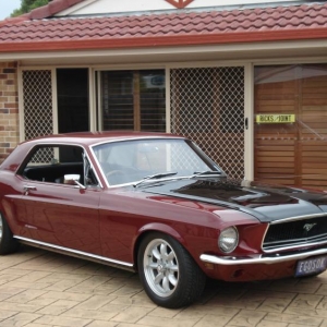 68 coupe , lowered , Pdisc brakes , warm 302 auto , debadged , black hood , set free grille pony !