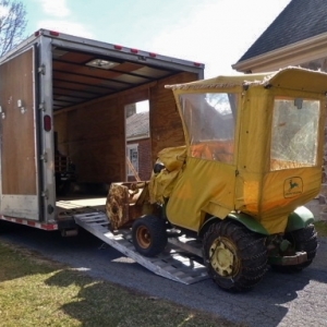 John Deere 110 with cab curtain