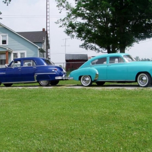 Note futuristic, areodynamic stylng of Fleetline, compared to traditional styling of a 49 Plymouth.