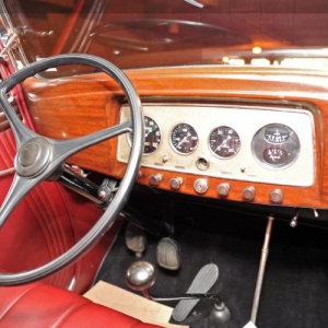 1932 Hupmobile Dash. Regularly overlooked for hot rod material but its got a close resemblance to an Auburn for a fraction of the cost. Notice how the panel is angled and recessed into the dashboard. The panel itself is just flat and would require the entire dashboard to have the recessed look.