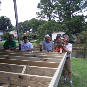 Sam, Brian, Lee, Noah, Sam Sr. build a deck.