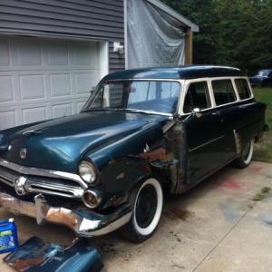 '52 Ford country sedan, bought a couple weeks ago. smashed front fender but rest is real solid.  Going to be a sweet cruiser in the spring.