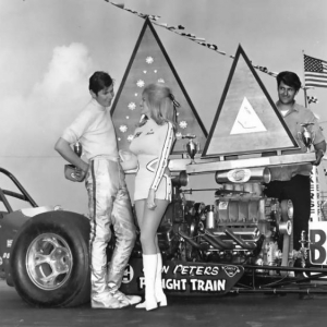 Sam Davis accepting the Top Gas trophy at the Bakersfield March Meet, 1970...Great guy, better friend.