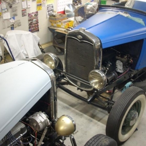 "Roll- A - Bone" Hot Rods; in the garage