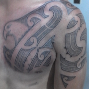 Jadens traditional Maori tattoo. represents his family.